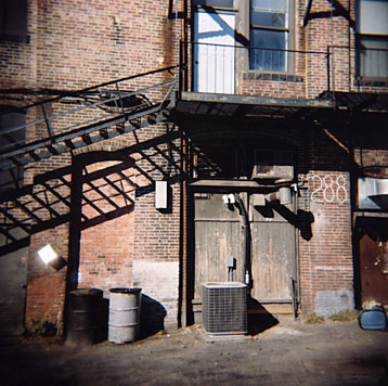 back alley doorway with fire escape